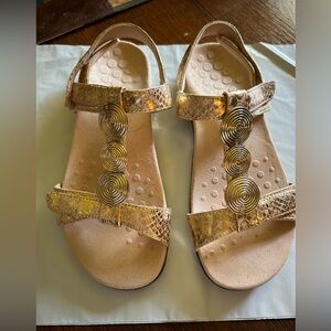 Vionic gold snakeskin embossed sandals.